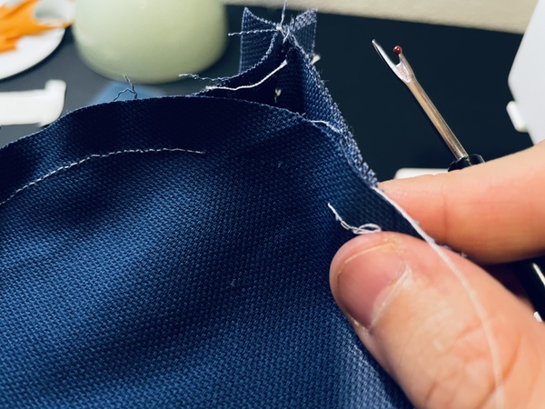 If you get to the end and you realize that the side fabric is too big, you can try to take a seam ripper to the part around the side seam.