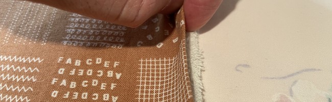 Tuck in the edges from the gap that you left open in step 3 and iron this down