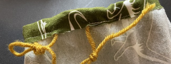 Knot the drawstring ends