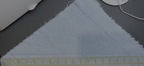 A right triangle with two 11” sides. The hypotenuse will be 15.5”