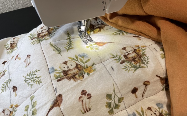 Stitch along the top with the longest length stitch