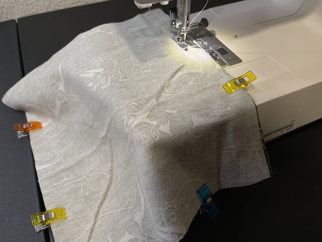 Sew with a straight stitch and 1/2” seam allowance from one long side, down to one short side then back up the other long side