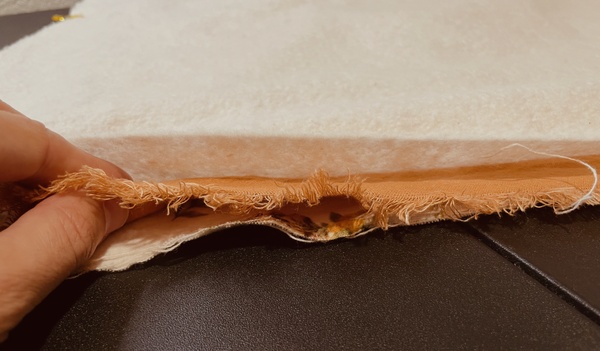 Layer fabric: Side A on top of Side B on top of your batting