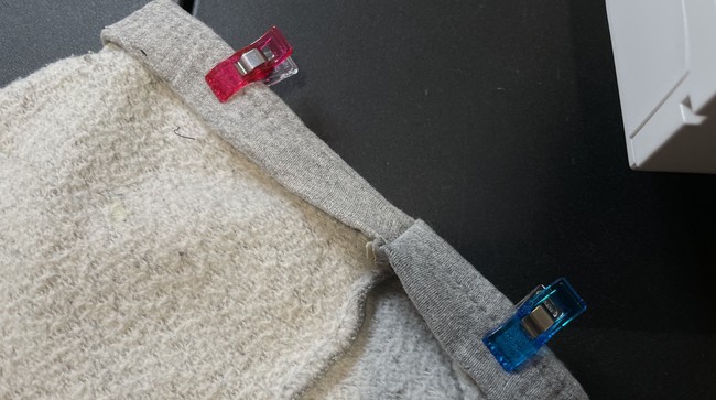 Flip your sweatpants inside out, fold the outside part in and clip