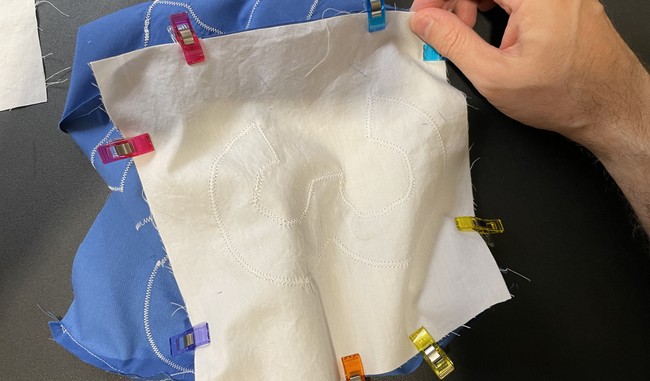 Clip the panel to the sides of the box