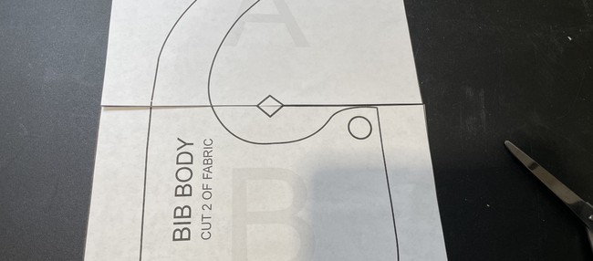 Print and cut out the bib pattern