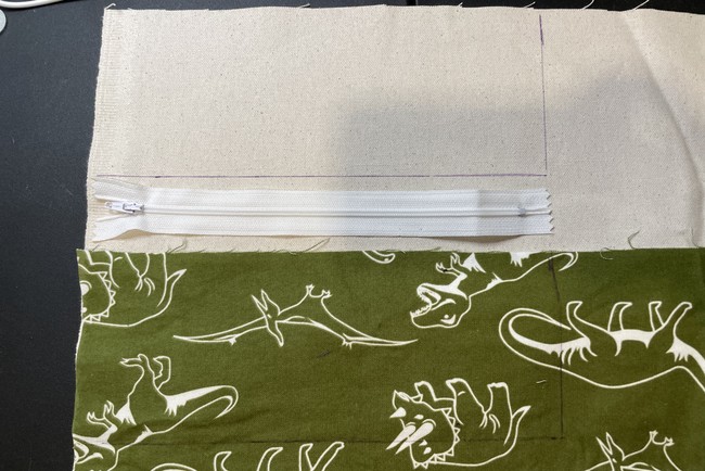 The width of the fabric will be based on the width of the zipper