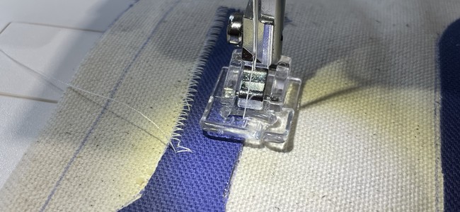 Appliqué the shapes on using a zig-zag stitch all the way around