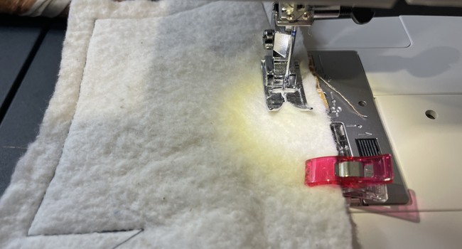 Stitch these layers together using a straight stitch and a 1/2” seam allowance