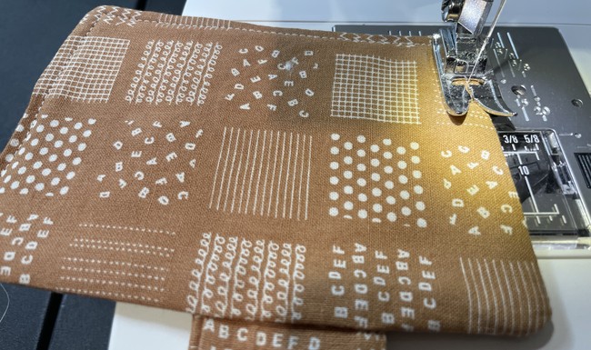 Stitch a top stitch around the body with a 1/8” seam allowance