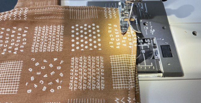 Sew the two sides together with a 1/4” seam allowance