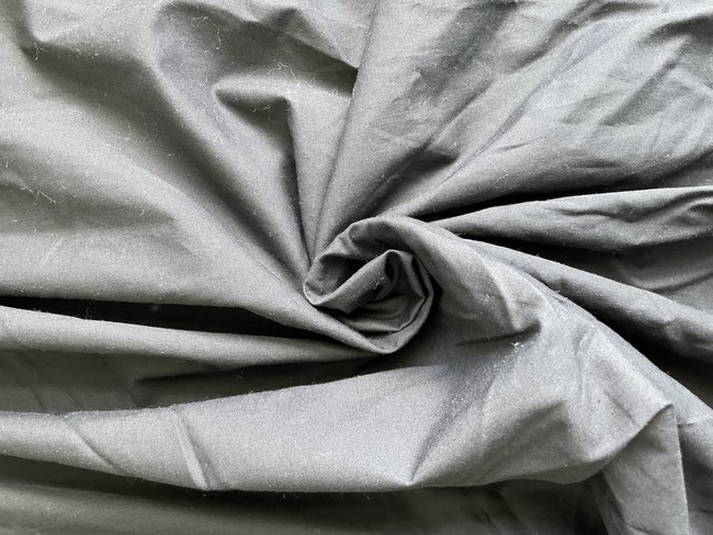 Broadcloth refers to a plain weave cotton with a slightly tighter weave and smoother finish than standard quilting cotton