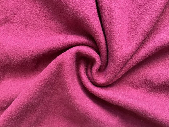Fleece is a synthetic knit fabric (usually made from polyester) with a brushed, fuzzy surface