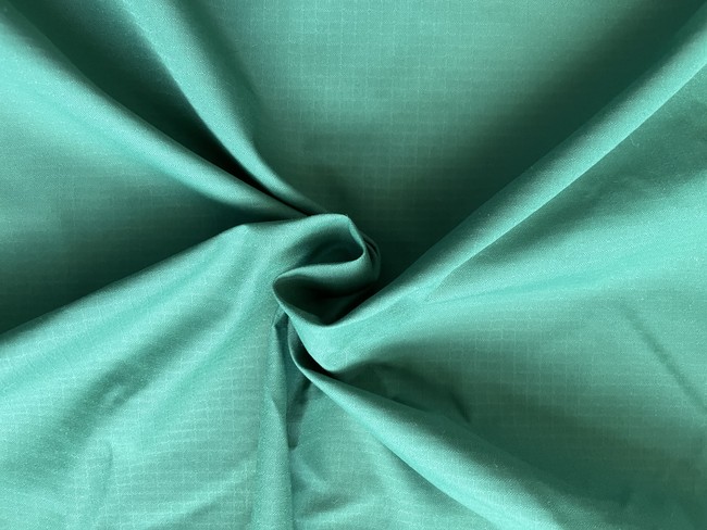 Nylon is a synthetic woven fabric that's lightweight, strong, and water-resistant