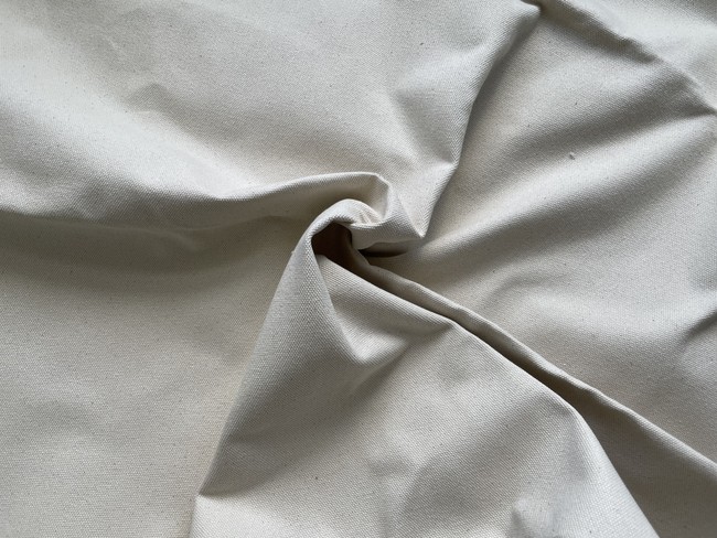 Upholstery fabric is a heavy-duty type of fabric designed to withstand the abuse of furniture, constant friction, body weight, spills, sun exposure. You can tell from the photo that it is thick and stiff